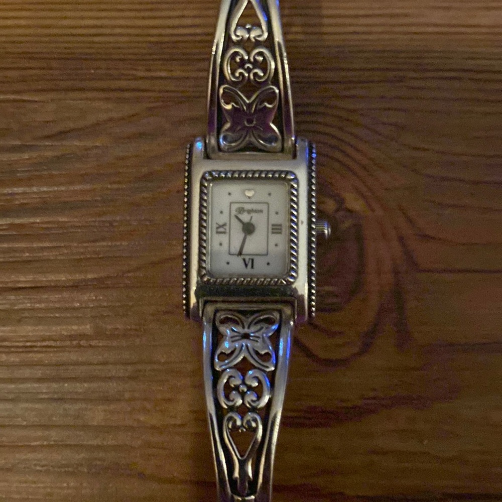 “Brighton”ladies silver watch with one extra link.Needs battery great condition